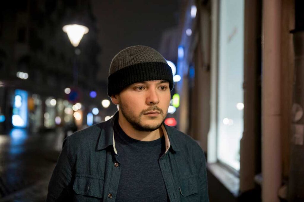 A symbolic depiction of Tim Pool's influential journey in independent journalism, highlighting his commitment to unbiased reporting and his impact in fostering informed societies.